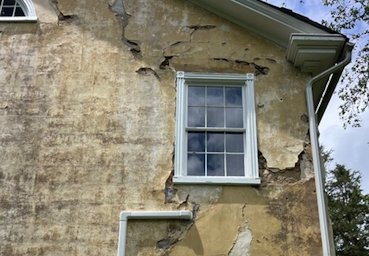 downspouts were probably stopped up.