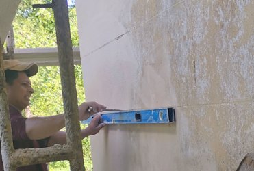 Stucco was scored to look like block.