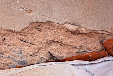 copper step flashing under the roof slates.