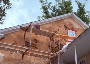 Loose mortar was removed including loose mortar in between the stones