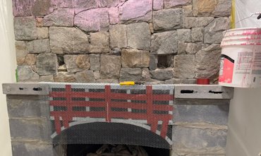 Stones are painted with pink plaster weld.