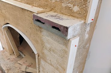 The arch is formed using PVC (plastic) trim.
