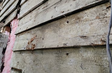 Metal lath and stucco was put on this original wood clapboard siding in Georgetown, Washington, DC.