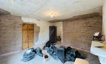 Loose plaster stripped off the wood lath in Shepherdstown, West Virginia