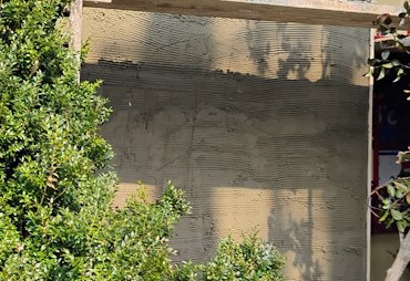 flex con in the scratch coat