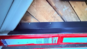 flashing over this trim board.
