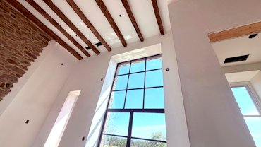 >Plaster walls and ceilings.