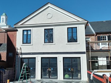 Finished stucco addition in Old Town Alexandria, Virginia.