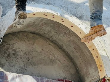 Arch was formed with a strip of 1/4 inch masonite.