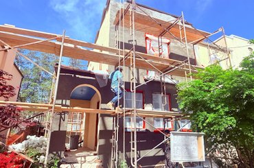 The front wall is patched, the chipped and recoated