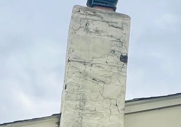 Chimney was stuccoed to match the house some years ago by inexperienced people in Silver Spring, Maryland