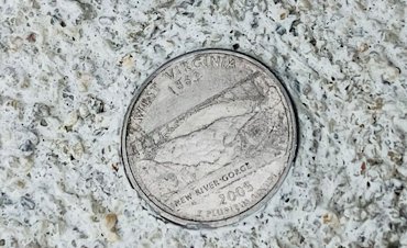 West Virginia quarter shows the bridge at the New River Gorge.