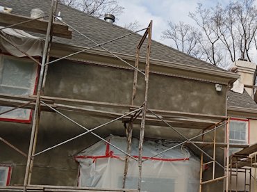 re-coating stucco in Great Falls, Virginia.