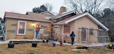 stucco had sloppy patches but never had been painted.