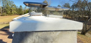 Chimney crown is sloped for water to run off.