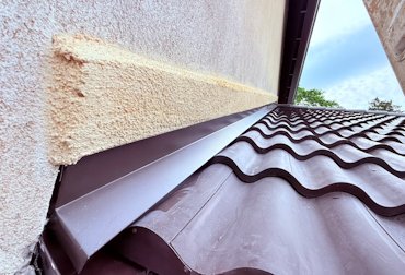 new Spanish tile roof.