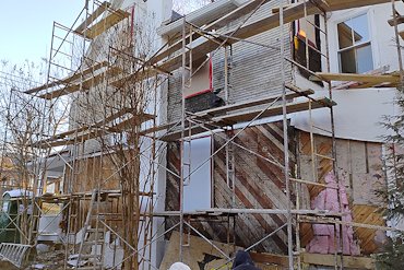 Tearing off the old stucco