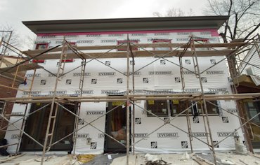 the house wrap was covered with tar paper.