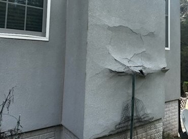 Interior lath was used, paper thin one coat stucco, flashing
was backwards