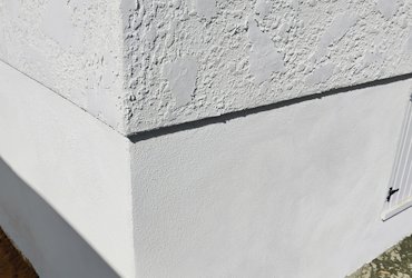 We stuccoed the foundation wall, too