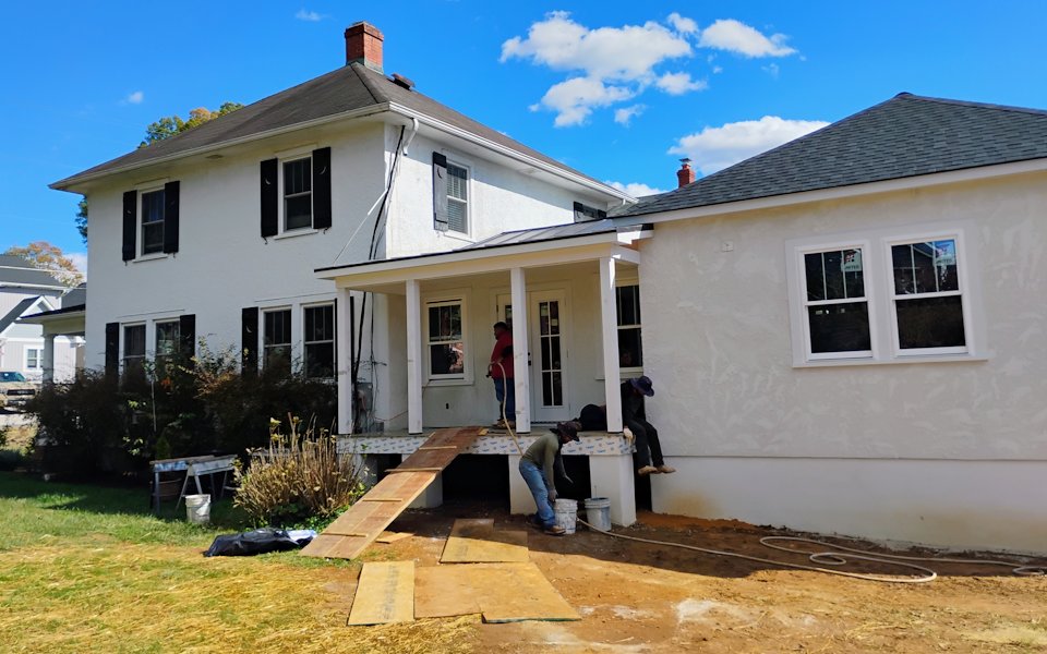New stucco addition on an old house.