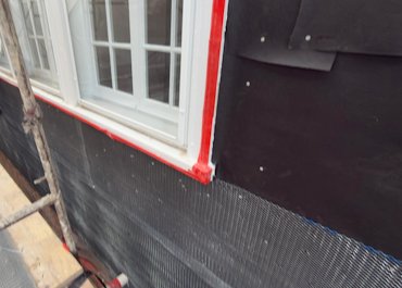 tar paper and self-furring metal lath.