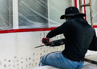 Wall is chipped and prepared for recoating