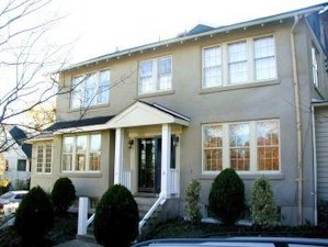 New stucco on old salmon brick. in Alexandria, Virginia