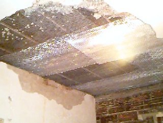 loose plaster removed