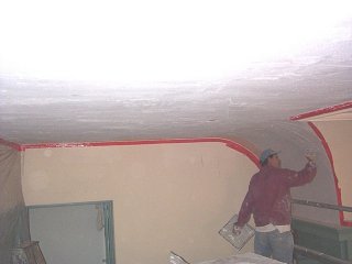 Carlos
              trowels on basecoat