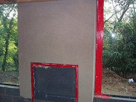We stuccoed
              the outside of this chimney