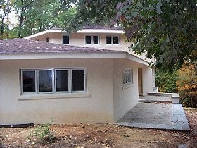 Finish is
              yellow sand and white portland cement.