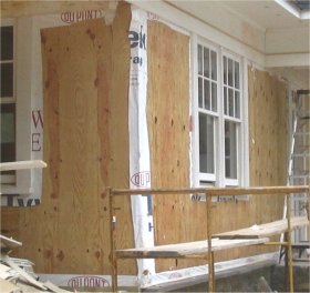 Pebble dash stucco on a new house