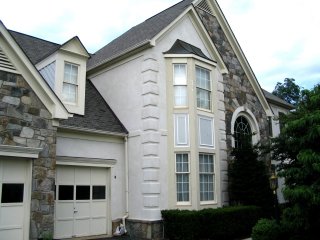 EIFS garbage off, stucco on