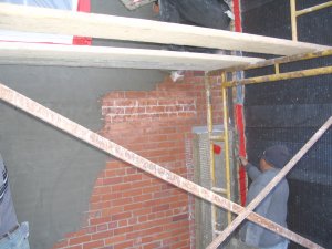 Scratch coat on bricks