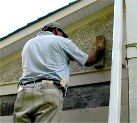 rocks are thrown into the finish mortar