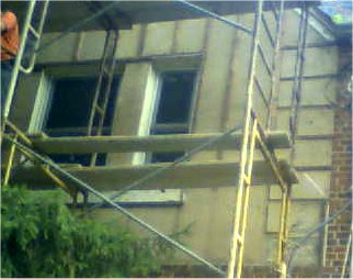 nice old quoins were  knocked off by the siding and furring