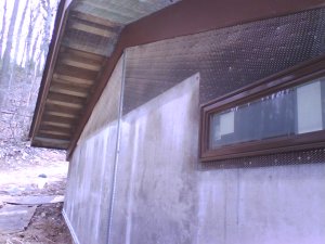 Ceiling and wood-framed areas have metal lath
              applied