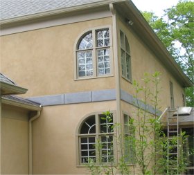 Stucco over fake masonite stucco