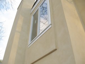 A view of the protuding panels around the windows