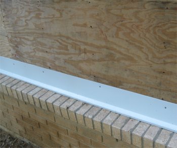 Flashing
                  over brick water table