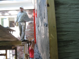 Brown coat on stucco addition