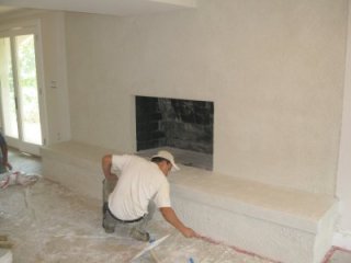 stucco fireplace and hearth