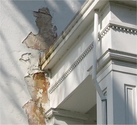 stucco was scored to look like block