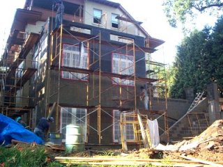 Addition on
              the back of the house is stucco on block
