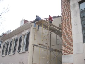 Historic stucco on this 1828 building replaced
