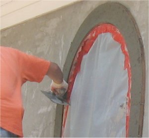 Forms are filled and straightened with a trowel