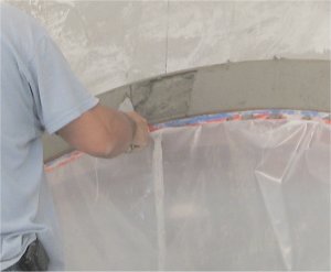 This is important: areas where the keystones go are marked and have
mortar scraped off