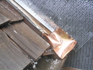 Copper kick-out flashing