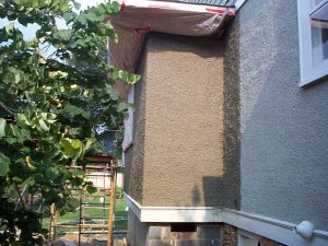 Finished pebble-dash stucco addition